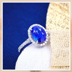 Solitaire Eternity - Diamant blanc et saphir bleu - Taille coussin - Or blanc