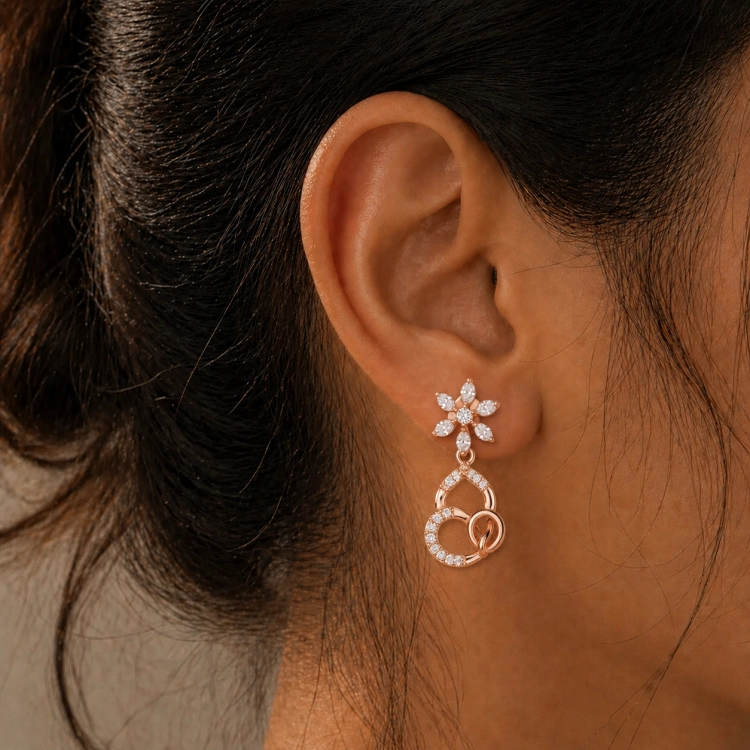 Boucles d’oreilles Lys · Diamant blanc et or rouge - Maison Haddad Joaillerie