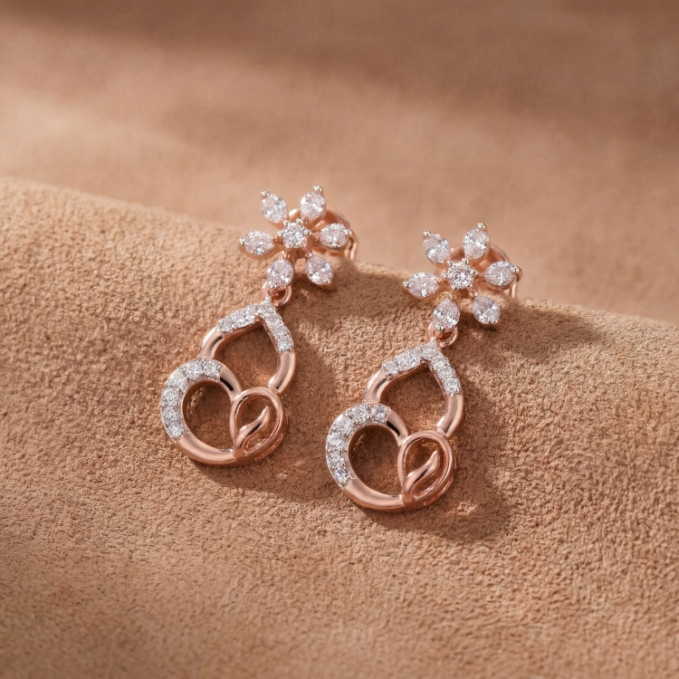 Boucles d’oreilles Lys · Diamant blanc et or rouge - Maison Haddad Joaillerie