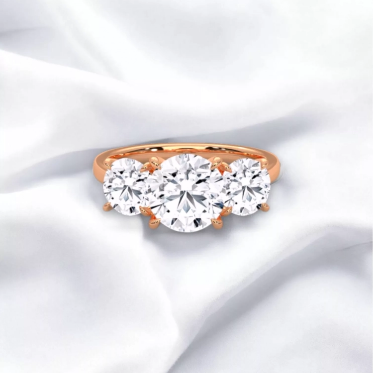 Solitaire Trilogie Or rouge - Diamant blanc taille rond